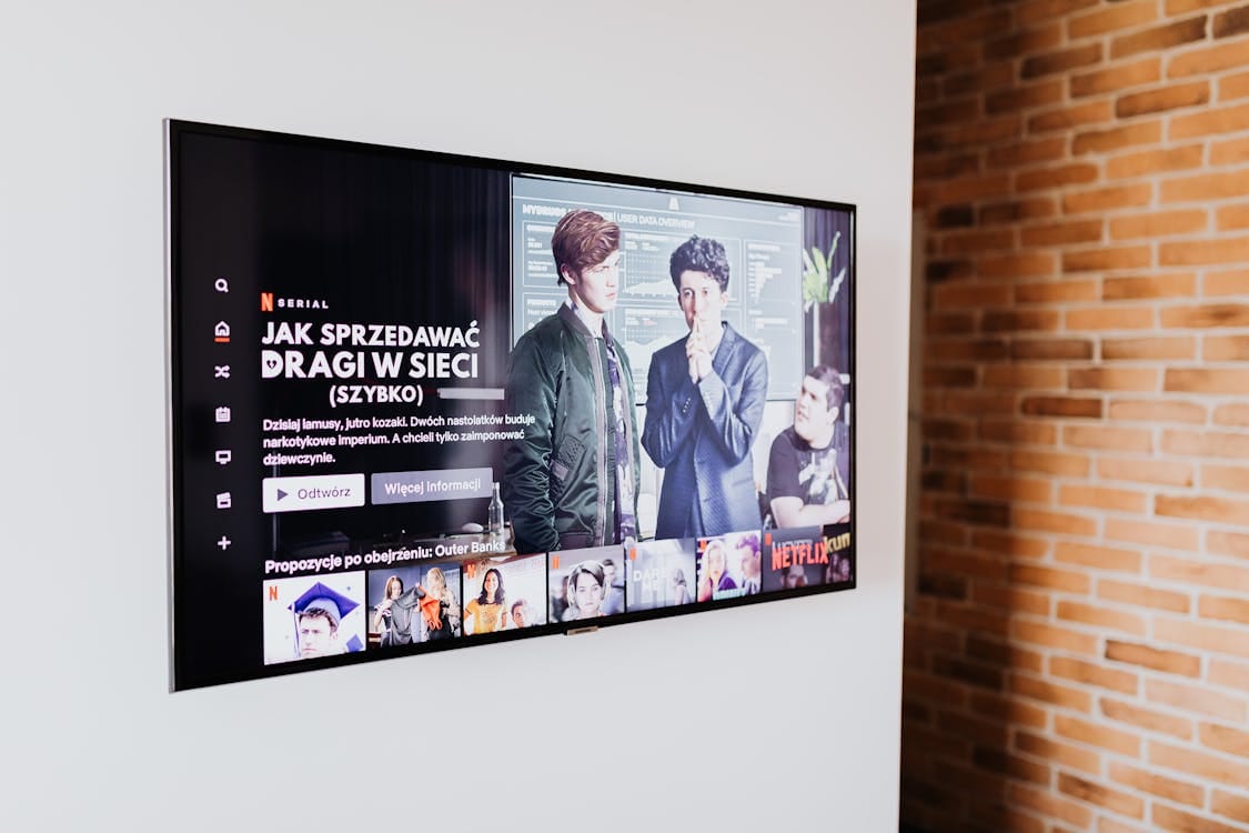 Smart TV mounted on wall displaying streaming content in modern Canadian living room