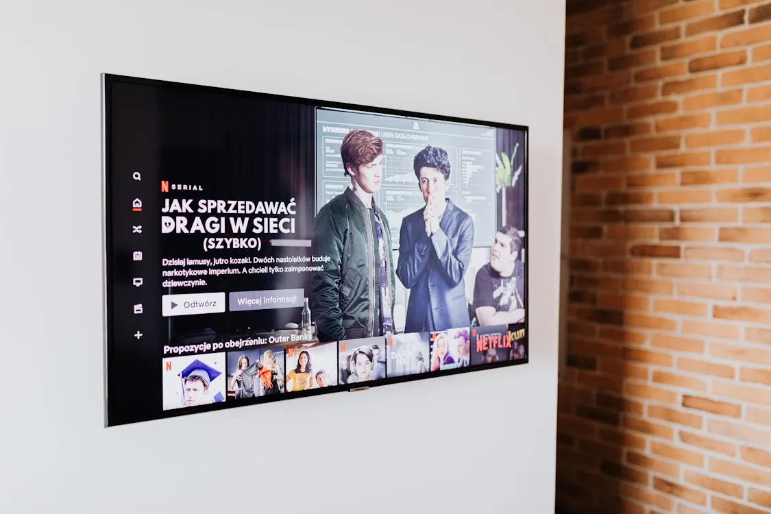 Smart TV mounted on wall displaying streaming content in modern Canadian living room